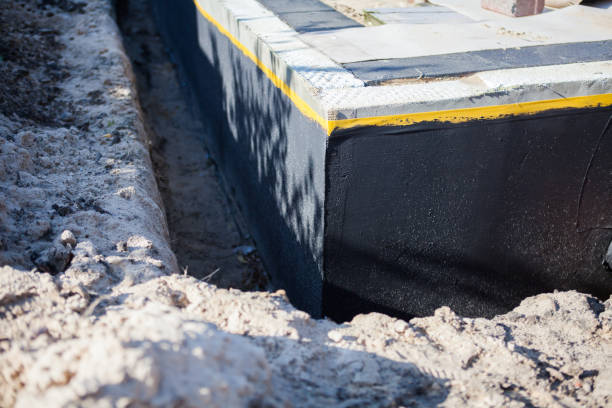 Professional Interior Drainage System technician working in Passaic, NJ